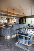 Vintage bar with grey panelled front