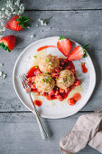 Potato dumplings with strawberry compote