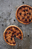 Two apple and blackberry tarts