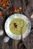 Pea cream soup with vegetable chips