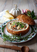 Beef and barley soup with mushrooms in bread bowl