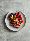 Grilled entrecote with cherry tomatoes