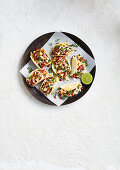 Korean bao tacos with duck, cannellini and cheese