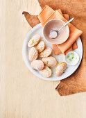 Lime sugar madeleines with grapefruit icing