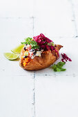 Sweet potatoes with chicken and jalapeno slaw
