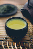 Green tea in a tea mug