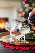 Champagne being poured into glasses