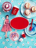 Paper doll and nostalgic kitchen accessories around red label