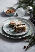 A vegan variation of traditional Slovenian Christmas cake with layers of poppyseeds, quark, nuts and plum compote