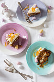 Easter carrot cake slices decorsted with mini eggs and candied orange peel