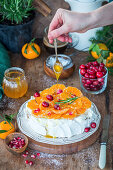 Pavlova with honey roasted tangerines