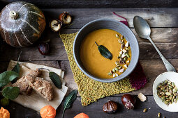 Vegan pumpkin soup with cripy sage leaves as a garnish