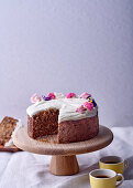Carrot, banana and beetroot cake with honey and yoghurt icing