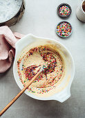 Cake dough with colourful sugar sprinkles