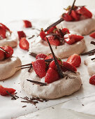 Mini chocolate pavlovas with strawberries