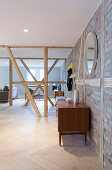 Sideboard against brick wall in period apartment