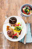 Meatballs with mashed potatoes and gold-stemmed chard