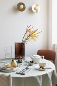 Simply set breakfast table in natural shades