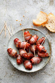 Tapas dates wrapped in bacon