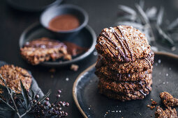 Gluten-free millet biscuits with chocolate coating and sea salt