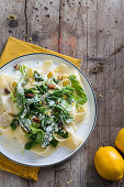 Papardelle with savoy cabbage, lemons and caramelised nuts