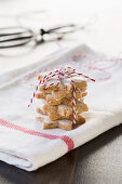 A stack of cinnamon stars tied with string