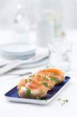 Baguette slices topped with smoked salmon