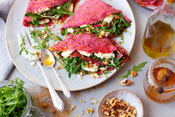 Crepes (with beetroot juice) with arugula nad feta