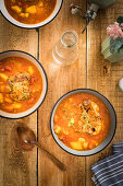 Beef tail soup with potatoes and thyme