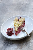 A piece of plum cake with streusel