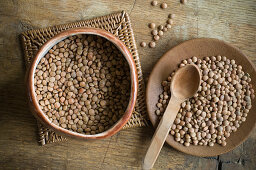 Mountain lentils in bowls on a rustic wooden surface