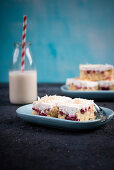 Vegan sponge cake with sour cherries and white rice milk chocolate cream