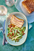 Spicy croque monsieur cake and courgette salad