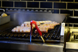 Sausages being grilled