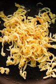 Spätzle (soft egg noodles from Swabia) in a pan