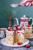 Puff pastry Napoleon cake with custard and strawberries