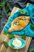 Khachapuri with spinach and egg