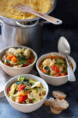 Minestrone with cauliflower, cherry tomatoes and pasta