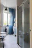 Modern bathroom in blue, grey and white