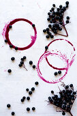 Elderberries and rings of elderberry juice