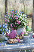 Forget-me-not - trio in white, pink and blue, decorated for Easter with Easter egg, chicken and onions