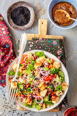 Tofu, quinoa and broccoli salad with peanut butter dressing