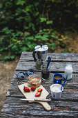 Breakfast on a wooden table outdoors