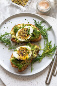 Sandwiches with avocado, egg and dukkah