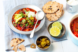 Vegetarian chili with avocado and sour cream