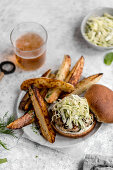 Turkey burger, on whole wheat bun with apple cabbage slaw and french fries