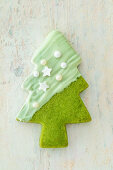 A shortbread Christmas tree with matcha powder and white chocolate