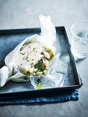 Haddock with cannellini beans and artichokes