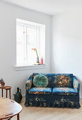 Vintage-style, blue, floral two-seater sofa