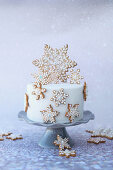 A festive Christmas cake decorated with snowflakes